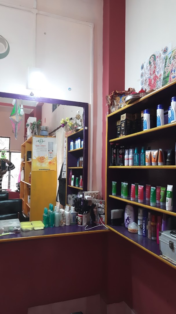 The parlour's mirror, shelves and maroon counter