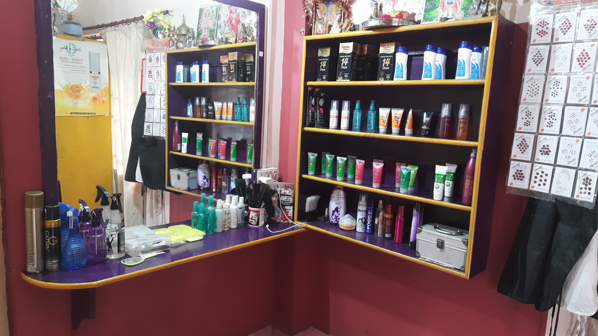 Shelves of hair and skin products in the parlour